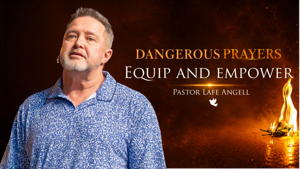 Man in a blue patterned shirt with a headset mic, standing beside a fiery banner that reads 'Dangerous Prayers' and 'Equip and Empower'.